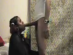 My white cock makes a fat, pigtailed South African bitch drop to her knees.